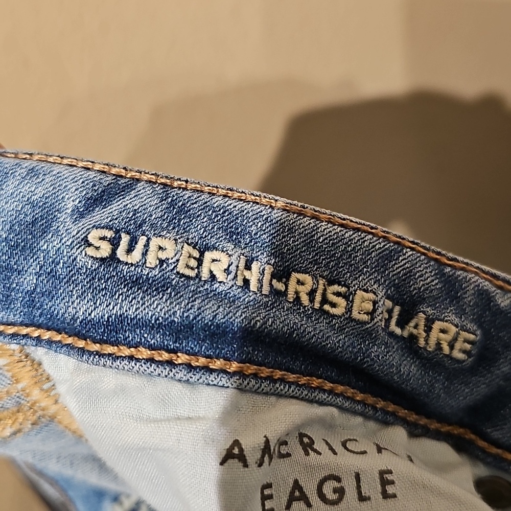 American Eagle Outfitters Super Hi-Rise Flare Size 10 Medium Blue Wide Leg Jeans - Picture 3 of 4